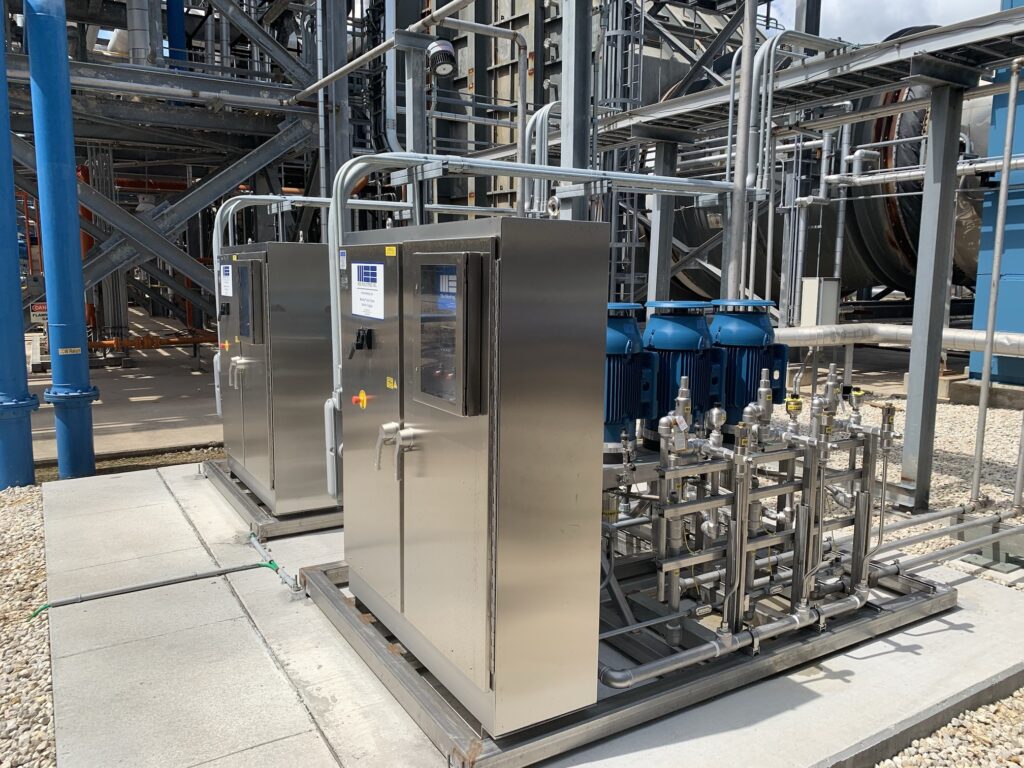MeeFog industrial pump skid system with stainless-steel control panels and high-efficiency pumps installed outdoors