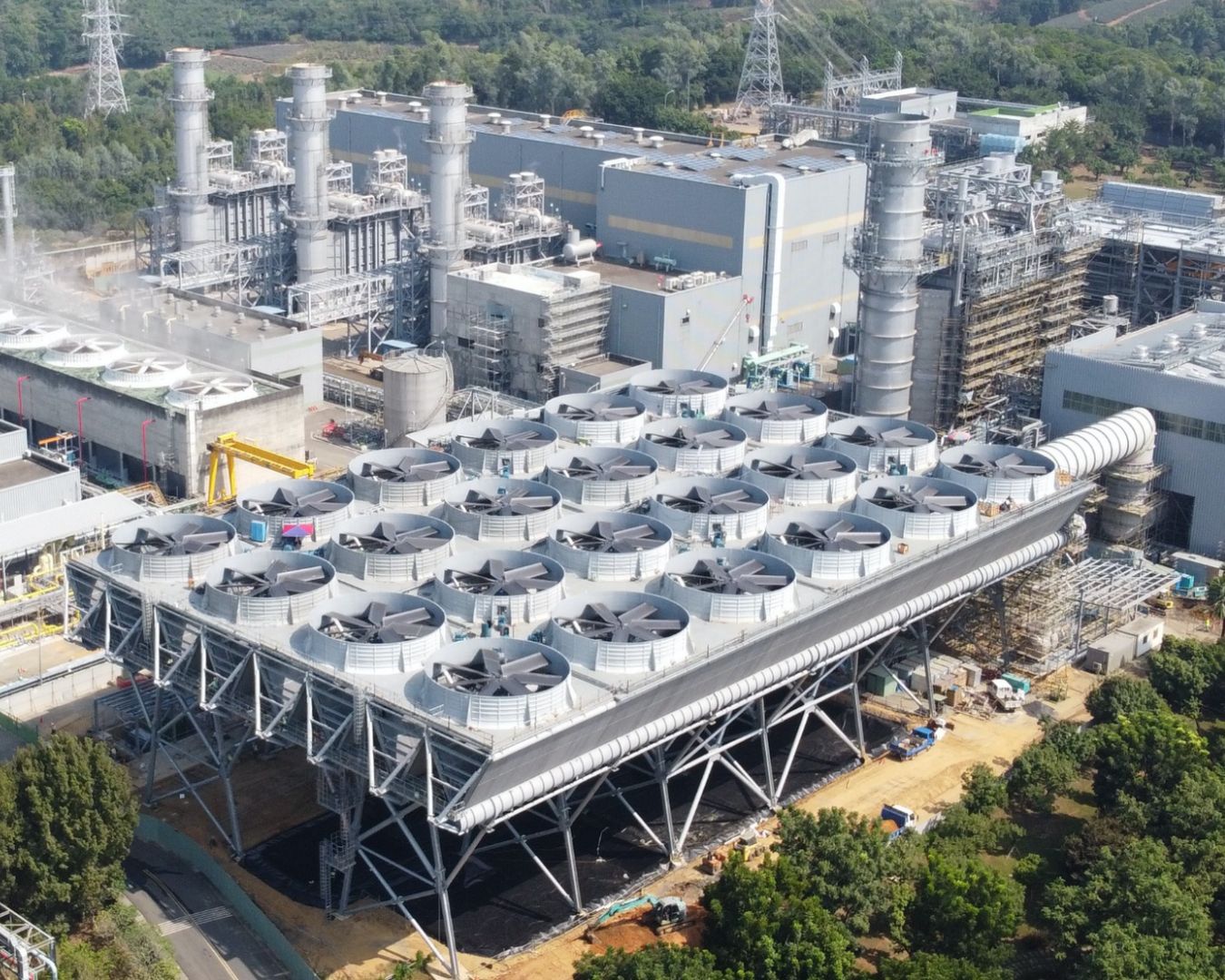 Aerial view of an industrial facility using large-scale cooling systems